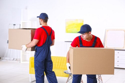 Professional office relocation planning in Bow with moving boxes and workspace setup