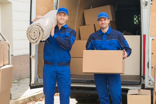 Secure office relocation services in Bow with labelled crates and careful equipment handling