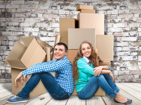 Removal team preparing a safe move with boxes and equipment