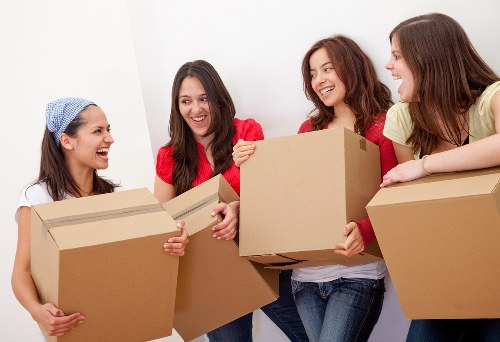 Organised moving boxes ready for house removals in Bow