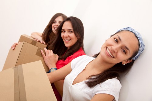 Movers using equipment for a safe flat relocation in Bow