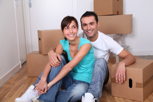 Organised moving boxes and packing materials prepared for a Bow property