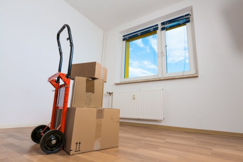 Household items being moved by a van service in Bow
