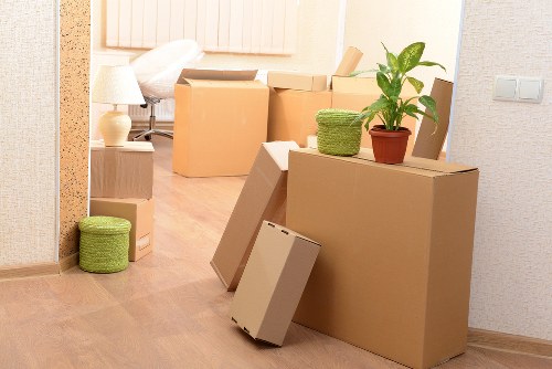 Charity reuse partnership receiving donated furniture from a clearance