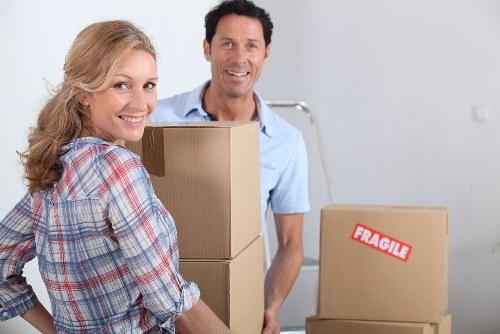 Packed boxes and household items prepared for transport in Bow