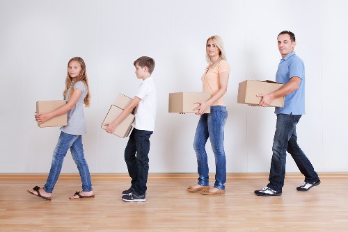 Manager assessing a removal service issue for fair resolution